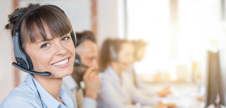 Customs-X Call center worker accompanied by her team